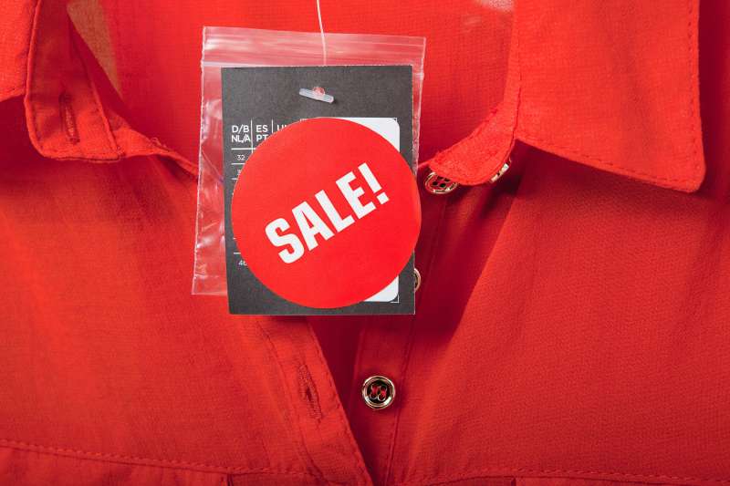 Sale tag on red blouse