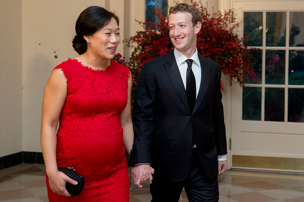 Mark Zuckerberg, chief executive officer and founder of Facebook Inc., right, and his wife Priscilla Chan arrive at a state dinner in honor of Chinese President Xi Jinping at the White House in Washington, D.C., U.S., on Friday, Sept. 25, 2015.