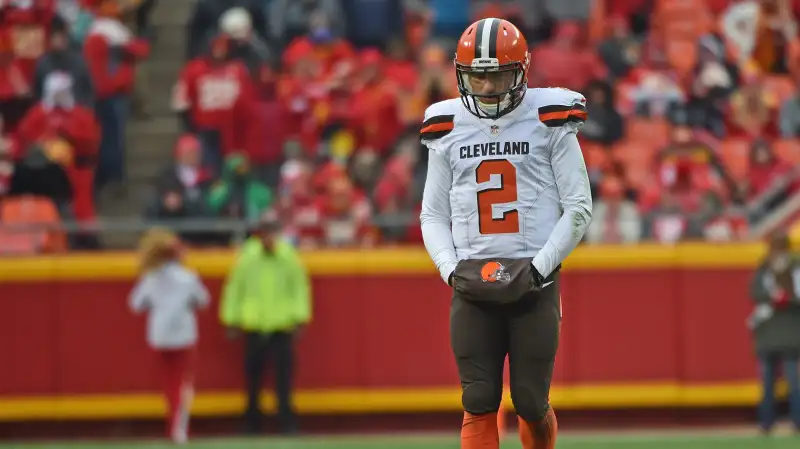 Quarterback Johnny Manziel #2 of the Cleveland Browns walks off the field, after a third down play against the Kansas City Chiefs during the first half on December 27, 2015 at Arrowhead Stadium in Kansas City, Missouri.