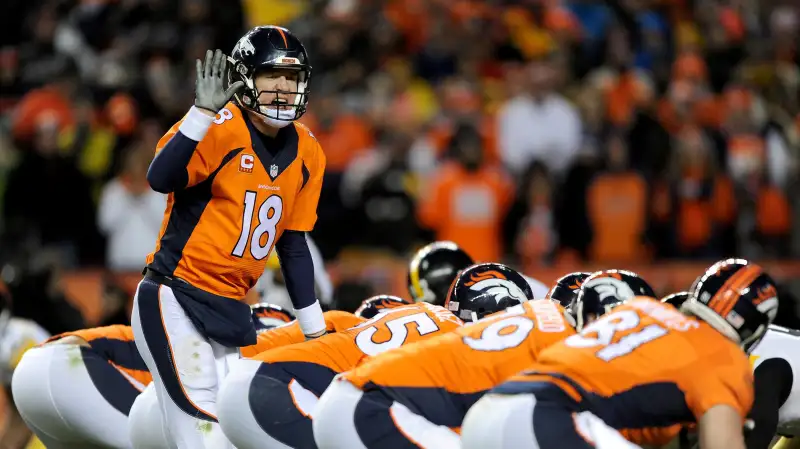 Peyton Manning #18 of the Denver Broncos calls a play against the Pittsburgh Steelers during the AFC Divisional Playoff Game at Sports Authority Field at Mile High on January 17, 2016 in Denver, Colorado.