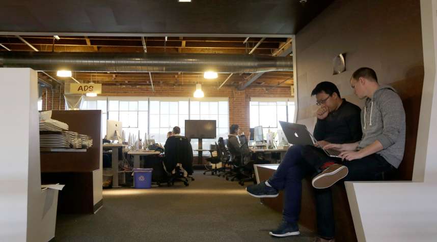 Pinterest employees work in the office in San Francisco, April 1, 2015. The San Francisco-based venture capital darling celebrated its fifth birthday in March 2015.