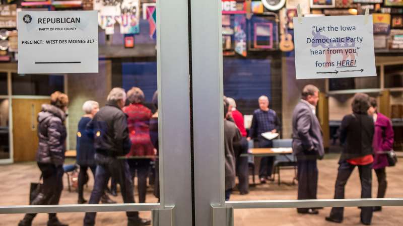 Signs direct Republican and Democratic caucus-goers in precinct 317 at Valley Church on February 1, 2016 in West Des Moines, Iowa. The Democratic and Republican Iowa Caucuses, the first step in nominating a presidential candidate from each party, took place on February 1.