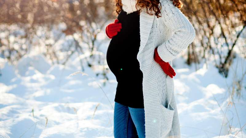 pregnant woman in snow
