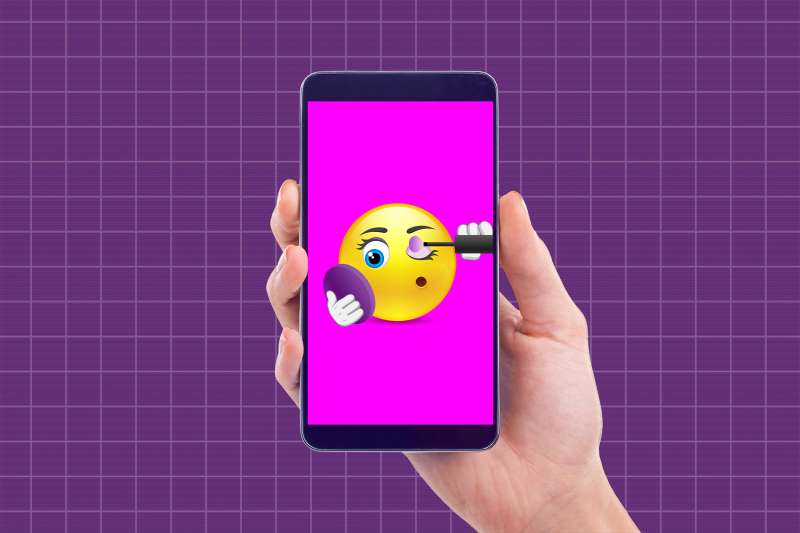 illustration of hand holding mobile phone with emoticon applying mascara