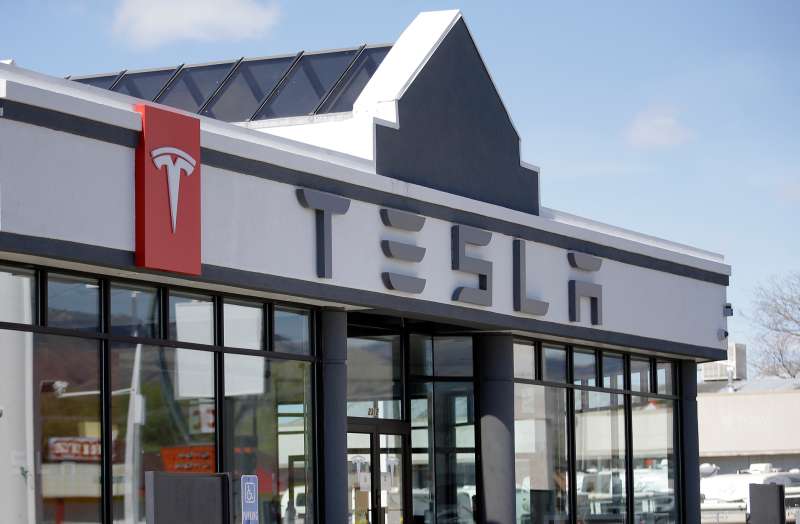 This April 1, 2015 photo shows the Tesla Motors new showroom in Salt Lake City.