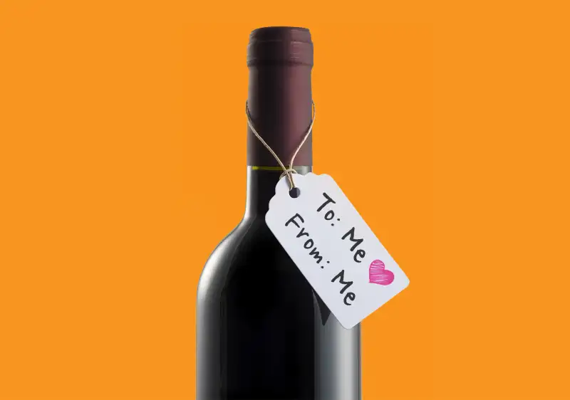 Wine bottle with card on it saying  To: Me  and  From: Me