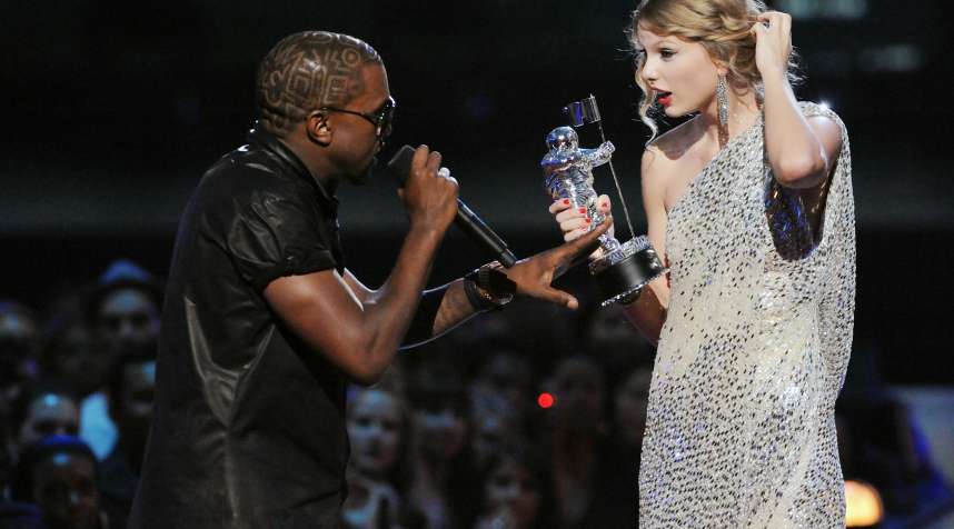 Kanye West jumps onstage as Taylor Swift accepts her award for the  Best Female Video  award during the 2009 MTV Video Music Awards.