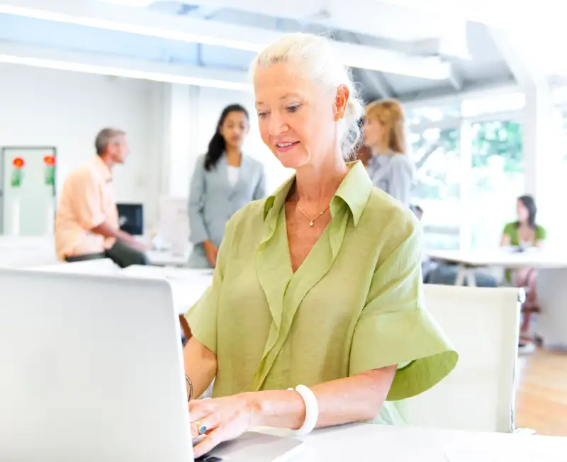 Modern Businesswoman working on a Laptop