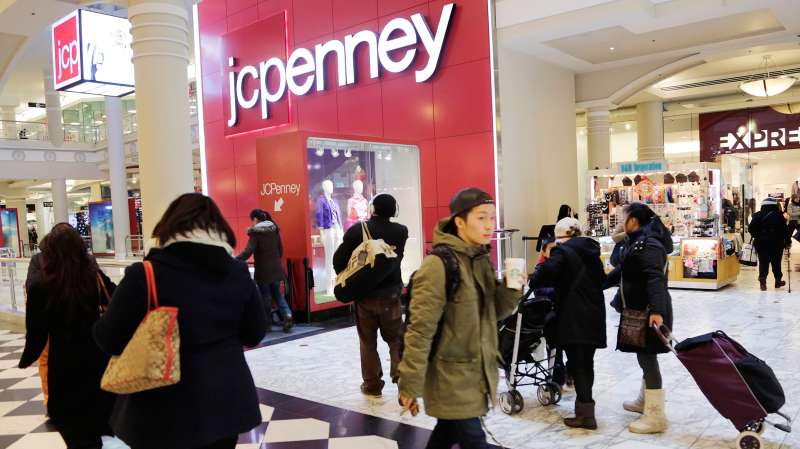 In this February 19, 2015 photo, shoppers visit a J.C. Penney store in New York.