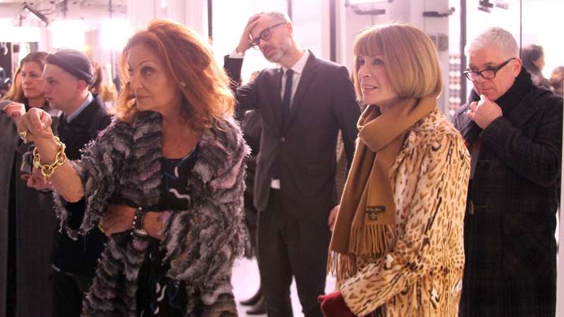 Designer Dian von Furstenberg talks with EIC of American Vogue Anna Wintour during the Diane von Furstenberg fashion presentation during New York Fashion Week at 440 W 14th St on February 14, 2016 in New York City.