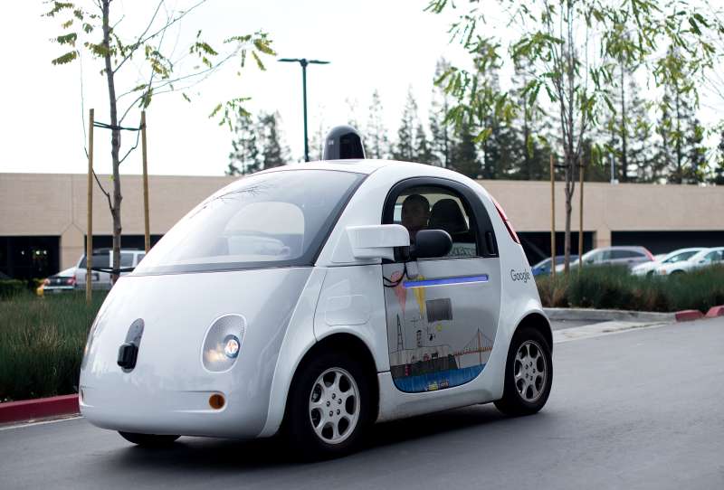 A self-driving car traverses a parking lot at Google's headquarters in Mountain View, California on Jan. 8, 2015.