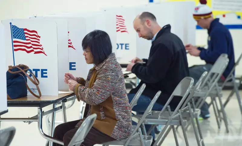 Virginia voters cast their Super Tuesday primary day ballots March 1, 2016, at Colin Powell Elementary School, in Centreville, Virginia. Voters in a dozen states will take part in  Super Tuesday  -- a series of primaries and caucuses in states ranging from Alaska to Virginia, with Virginia the first to open its polling stations at 6:00 am (1100 GMT).