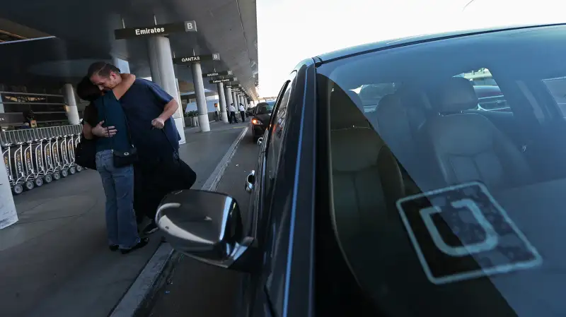 An Uber driver drops off a passenger at LAX, October 20, 2015.