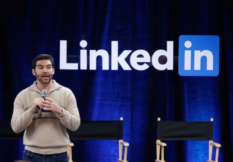 In this Nov. 6, 2014, file photo, LinkedIn CEO Jeff Weiner speaks during the company's second annual  Bring In Your Parents Day,  at LinkedIn headquarters in Mountain View, California LinkedIn reports quarterly financial results on Feb. 4, 2016.
