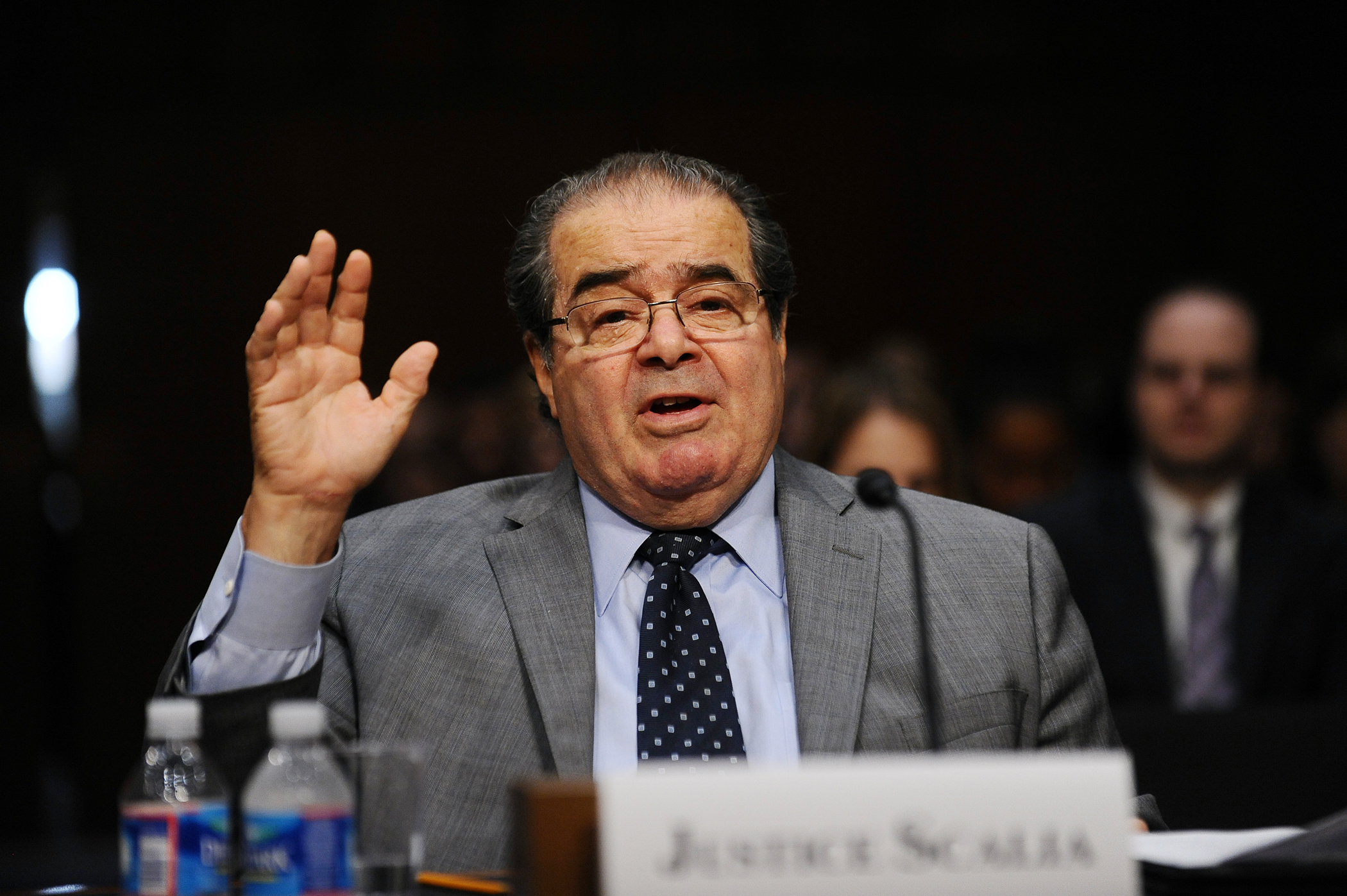 US Supreme Court Justice Antonin Scalia speaks as he along with Justice Stephen Breyer testify before the Senate Judiciary Committee at a hearing entitled, “Considering the Role of Judges Under the Constitution of the United States  at the Hart Senate Office Building in Washington, DC, on October 5, 2011.