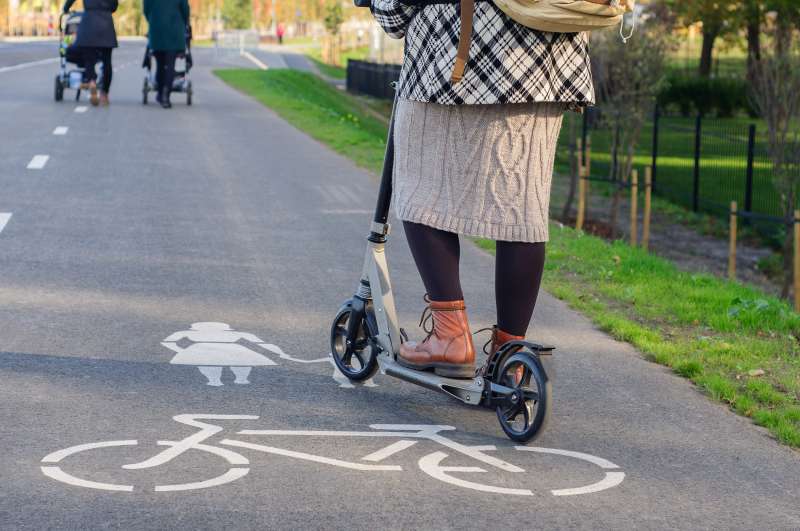 woman on scooters