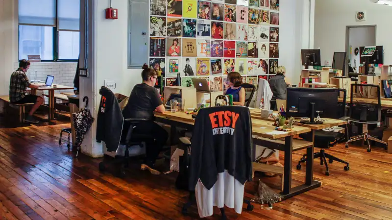 Employees work at Etsy Inc. headquarters in the Brooklyn on August 11, 2015.