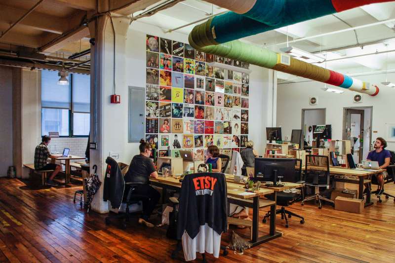 Employees work at Etsy Inc. headquarters in the Brooklyn on August 11, 2015.