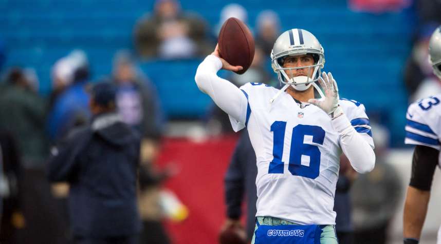 Matt Cassel #16 of the Dallas Cowboys warms up before the game against the Buffalo Bills on December 27, 2015 at Ralph Wilson Stadium in Orchard Park, New York.  Buffalo defeated Dallas 16-6.