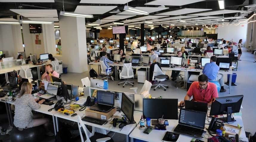 Around 600, mostly young employees in their 20s, fill the office spaces at several Washington D.C. locations of livingsocial, a young company that planted its headquarters in the nation's capital, July 27, 2011.