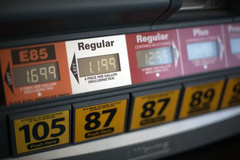 A gas pump reflects lower gas prices February 12, 2016 at a north west Oklahoma City, Oklahoma gas station.