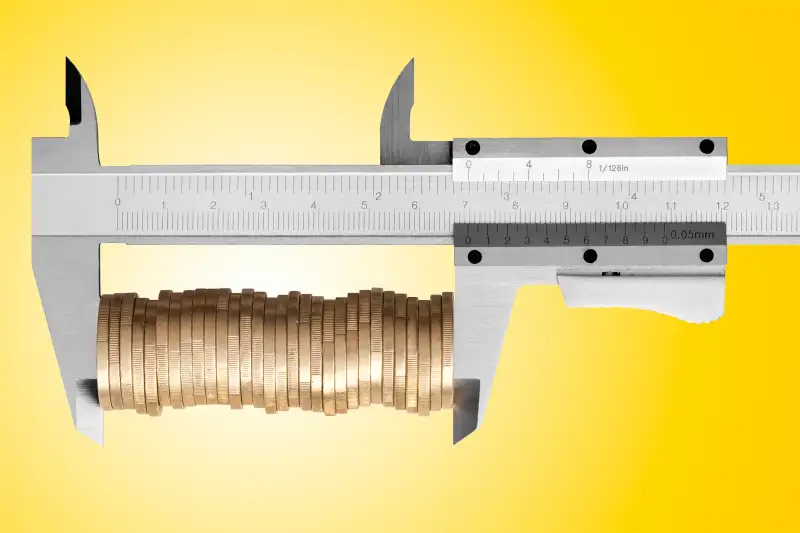 caliper with coins in it