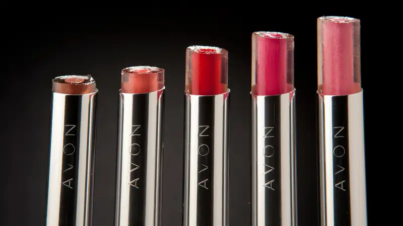 Avon Products Inc. are arranged for a photograph in New York, on Feb. 15, 2012. Avon Products Inc., the door-to-door cosmetics seller conducting an internal bribery probe, rose the most in two months after saying it will cut jobs and identify other ways to reduce costs.