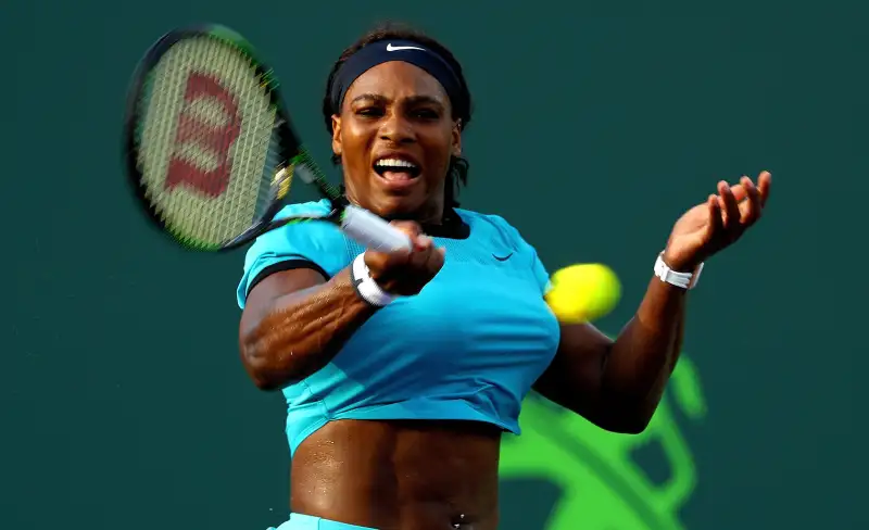Serena Williams plays a match against Zarina Diyas of Kazakhstan during Day 6 of the Miami Open presented by Itau at Crandon Park Tennis Center on March 26, 2016 in Key Biscayne, Florida.
