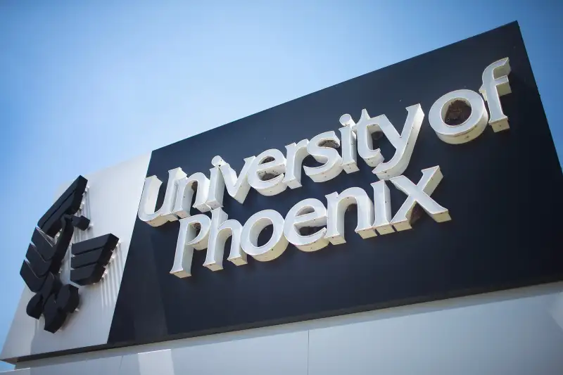 A sign marks the location of the University of Phoenix Chicago Campus on July 30, 2015 in Schaumburg, Illinois.
