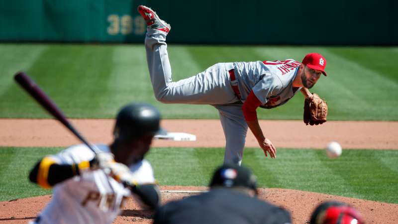 St. Louis Cardinals starting pitcher Adam Wainwright (50) delivers to Pittsburgh Pirates' Andrew McCutchen (22) during the fifth inning of the opening day baseball game in Pittsburgh, Sunday, April 3, 2016. The Pirates won 4-1, with Wainwright taking the loss.