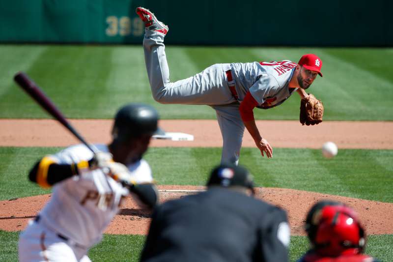 St. Louis Cardinals starting pitcher Adam Wainwright (50) delivers to Pittsburgh Pirates' Andrew McCutchen (22) during the fifth inning of the opening day baseball game in Pittsburgh, Sunday, April 3, 2016. The Pirates won 4-1, with Wainwright taking the loss.