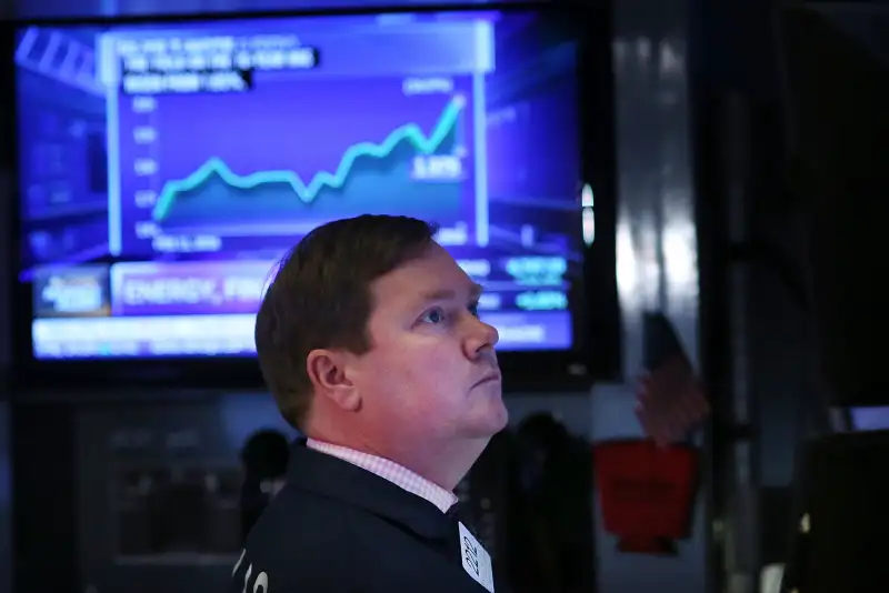 Traders work on the floor of the New York Stock Exchange (NYSE) on March 11, 2016 in New York City.