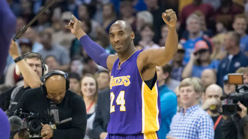 Kobe Bryant #24 of the Los Angeles Lakers greets fans before the first quarter of a NBA game against the Oklahoma City Thunder during his last road game at the Chesapeake Energy Arena on April 22, 2016 in Oklahoma City, Oklahoma.