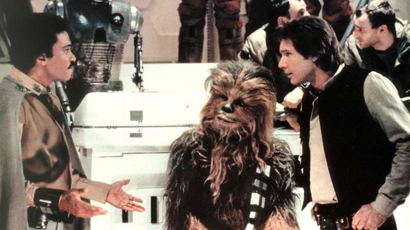 Billy Dee Williams, Peter Mayhew (Chewbacca), and Harrison Ford in Star Wars Episode VI: Return of the Jedi