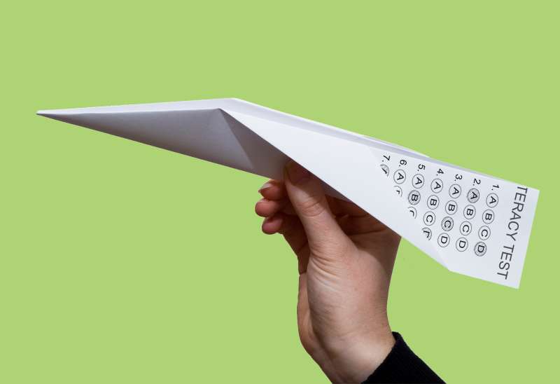 paper airplane made out of literacy test