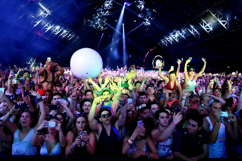 Music fans attend day 2 of the 2015 Coachella Valley Music &amp; Arts Festival (Weekend 1) at the Empire Polo Club on April 11, 2015 in Indio, California.