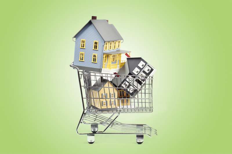 shopping cart with houses in it