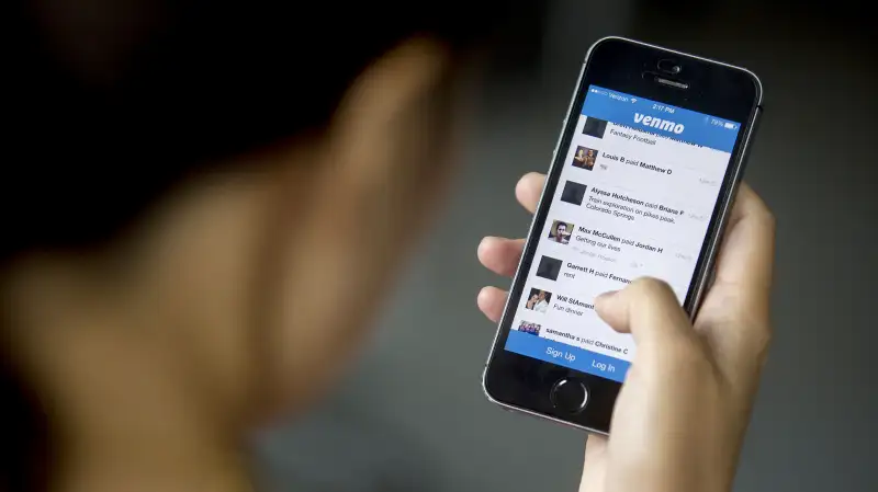 The Venmo application is shown on an Apple iPhone 5s in Washington, D.C., on August 22, 2014.