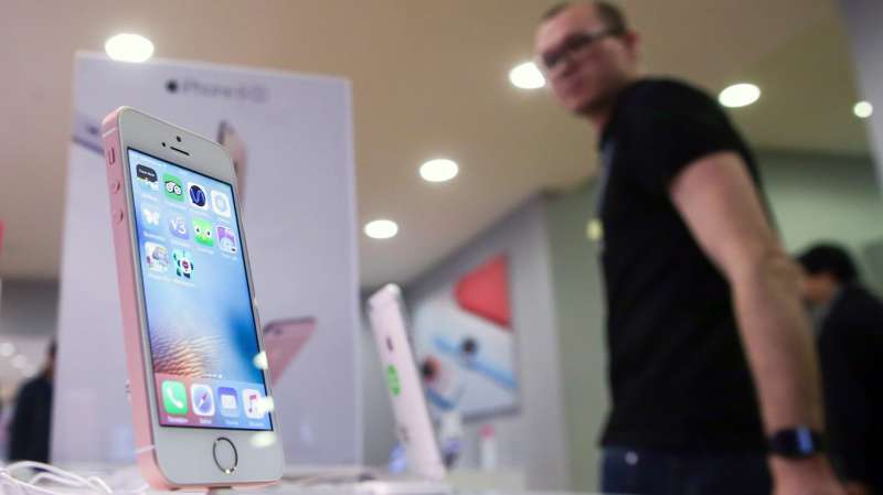 An Apple iPhone 5se at an Apple retail store in Moscow, Russia, April 5, 2016.