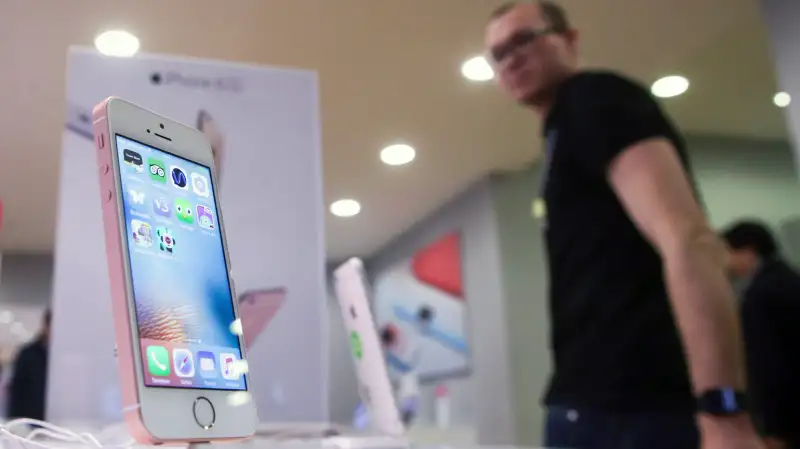 An Apple iPhone 5se at an Apple retail store in Moscow, Russia, April 5, 2016.