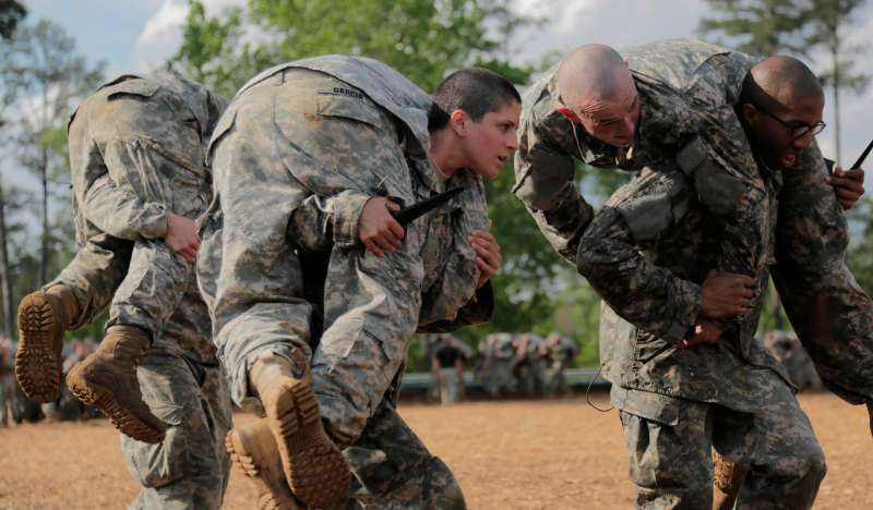 Handout photo shows Then U.S. Army First Lieutenan Kirsten Griest and fellow soldiers participating in combatives training during the Ranger Course on Fort Benning, Georgia