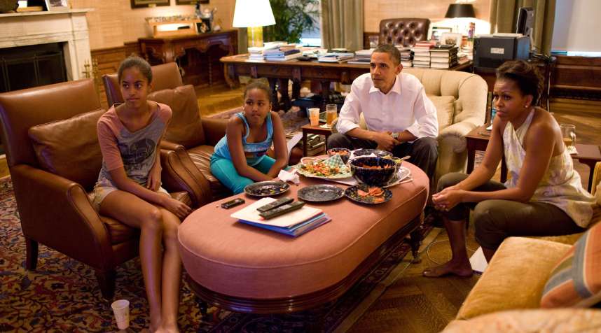 The Obama family watching World Cup soccer.
