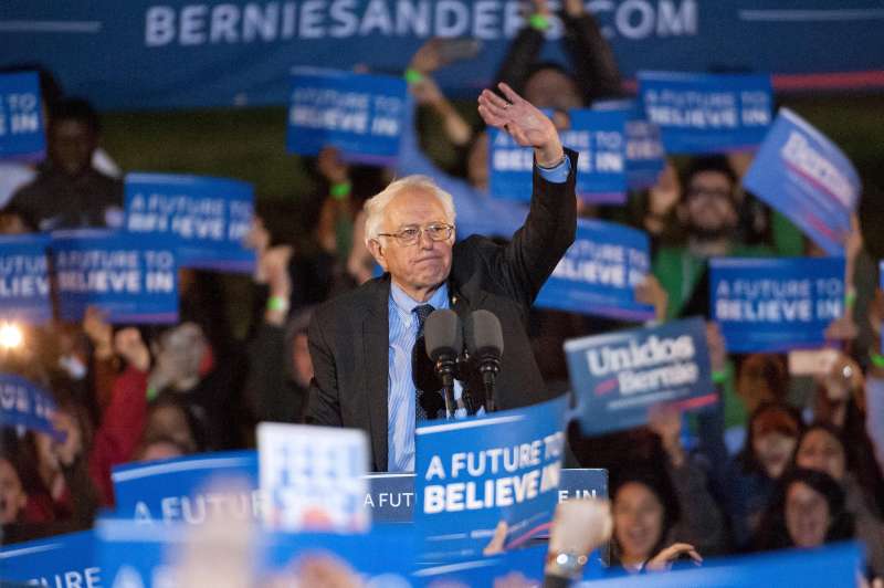 2016 Democratic presidential candidate U.S. Senator Bernie Sanders (D-VT) waves to supporters at a campaign event at Saint Mary's Park on March 31, 2016 in New York City.