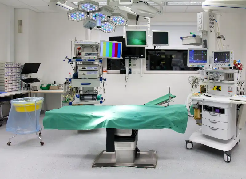 Operating table and equipment in vacant operating room