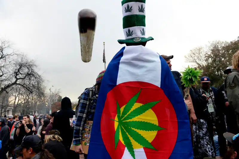 Pot smokers parttake in smoking pot at 4:20 pm on 4/15/2105 in Denver, Colorado