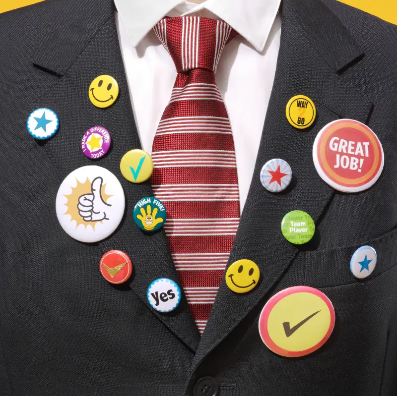 man wearing suit with flare buttons all over it
