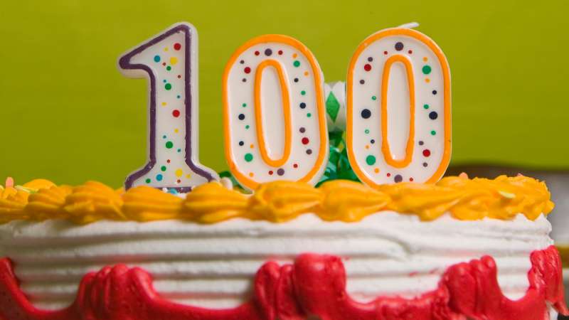 100 spelled in birthcdy candles