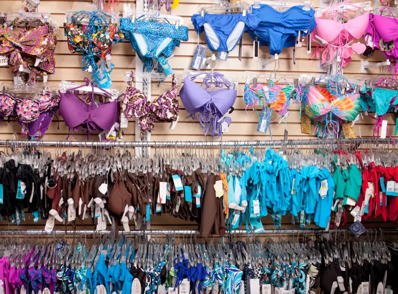 Bathing suits on wall in store