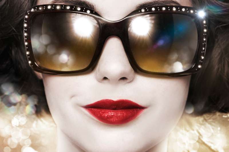 Close up of woman with designer sun glasses