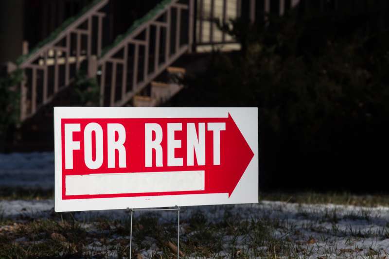 Home for rent sign with red arrow